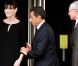 Carla-Bruni Sarkozy (enceinte de son 2e enfant) et son époux Nicolas  Sarkozy sur le perron du restaurant Le Ciro's, à Deauville, le 26 mai  2011.