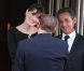 Carlita, enceinte, et Nicolas Sarkozy accueillent Silvio Berlusconi au Ciro's, à Deauville. 