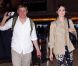 Tyler Jacob Moore et Emmy Rossum à l'aéroport LAX de Los Angeles, en partance pour Londres, le 26 mai 2011.