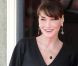 Carla Bruni-Sarkozy enceinte reçoit les conjoints et conjointes des membres de la délégation du sommet du G8, à Deauville.
