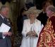 Le prince de Galles Charles et la duchesse de Cornouailles Camilla Parker Bowles en compagnie du révérend David Conner à la chapelle George du Château de Windsor pour l'anniversaire du duc d'Edimbourg qui célèbre ses 90 ans le 12 juin 2011