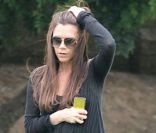 Victoria Beckham ne peut plus cacher son ventre début juin 2011