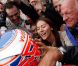  Jessica Michibata et john Button félicitent leur héros, Jenson Button, à l'arrivée du Grand Prix de Hongrie. 
 Dimanche 31 juillet 2011, Jenson Button remportait le 11e Grand Prix de sa carrière en Hongrie, sur le Hungaroring, pour son 200e départ en F1. 