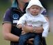 Le 6 août 2011 à Gatcombe Park, Peter Phillips, frère aîné de Zara, et sa femme Autumn étaient présents avec leur bébé, Savannah, pour le British Festival of Eventing. 