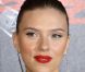 L'actrice Scarlett Johansson arborait un rouge à lèvres pulpeux lors d'un photocall pour le film The Spirit . Paris, le 9 décembre 2008.