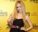 Avril Lavigne séduit le monde de la mode avec son style de lolitrash
