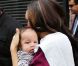 Les jumelles Tia (avec le bébé) et Tamera Mowry arrivent sur le plateau de l'émission américaine, Wendy Williams Show. New York, 27 septembre 2011