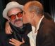 Woody Harrelson, en plein scandale pour Rampart, très câlin avec Michael Stipe