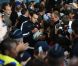 Une foule compact attendait Les rugbymen du XV de France à l'aéroport lors de leur retour de Nouvelle-Zélande à Paris le 26 octobre 2011