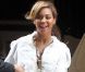 Beyoncé affiche sa belle silhouette de future maman, radieuse dans les rues de New York le 3 novembre 2011