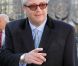 Le prince Laurent de Belgique, toujours vindicatif, et sa femme la princesse Claire arrivent pour la cérémonie du Te Deum en la cathédrale des Saints Michel-et-Gudule de Bruxelles, dans le cadre de la Fête du Roi, mardi 15 novembre 2011.