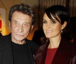 Johnny Hallyday et Laeticia lors de la soirée en l'honneur de Christian Louboutin à Paris à la galerie du passage. Le 21 novembre 2011