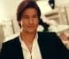 Mickaël Vendetta et son collier "M" dans un film publicitaire pour le coiffeur Chrisland