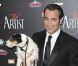 Uggie, le chien de The Artist et Jean Dujardin, lors de l'avant-première du film à Berlin le 3 janvier 2012 