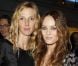 Sandrine Kiberlain et Vanessa Paradis au Dîner de la mode pour le Sida au Pavillon d'Armenonville à Paris, le 26 janvier 2012.