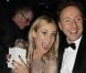 Diane Kruger et Stéphane Bern au Dîner de la mode pour le Sida au Pavillon d'Armenonville à Paris, le 26 janvier 2012.