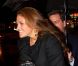 La princesse Madeleine de Suède, abritée par son boyfriend, arrive au Carnegie Hall, à New York, pour un concert du Swedish Youth Orchestra, le 26 janvier 2012.