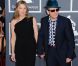 Diana Krall et son mari Elvis Costello sur le tapis rouge de la cérémonie des 54e Grammy Awards au Staples Center de Los Angeles le 12 février 2012. Les stars étaient nombreuses à être venues accompagnées pour la grand-messe des récompenses musicales américaines.