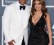 Flo Rida et une invitée sur le tapis rouge de la cérémonie des 54e Grammy Awards au Staples Center de Los Angeles le 12 février 2012. Les stars étaient nombreuses à être venues accompagnées pour la grand-messe des récompenses musicales américaines.
