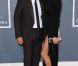 John Legend et sa fiancée Chrissy Teigen sur le tapis rouge de la cérémonie des 54e Grammy Awards au Staples Center de Los Angeles le 12 février 2012. Les stars étaient nombreuses à être venues accompagnées pour la grand-messe des récompenses musicales américaines.