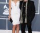 Malin Akerman et son mari Roberto Zincone sur le tapis rouge de la cérémonie des 54e Grammy Awards au Staples Center de Los Angeles le 12 février 2012. Les stars étaient nombreuses à être venues accompagnées pour la grand-messe des récompenses musicales américaines.