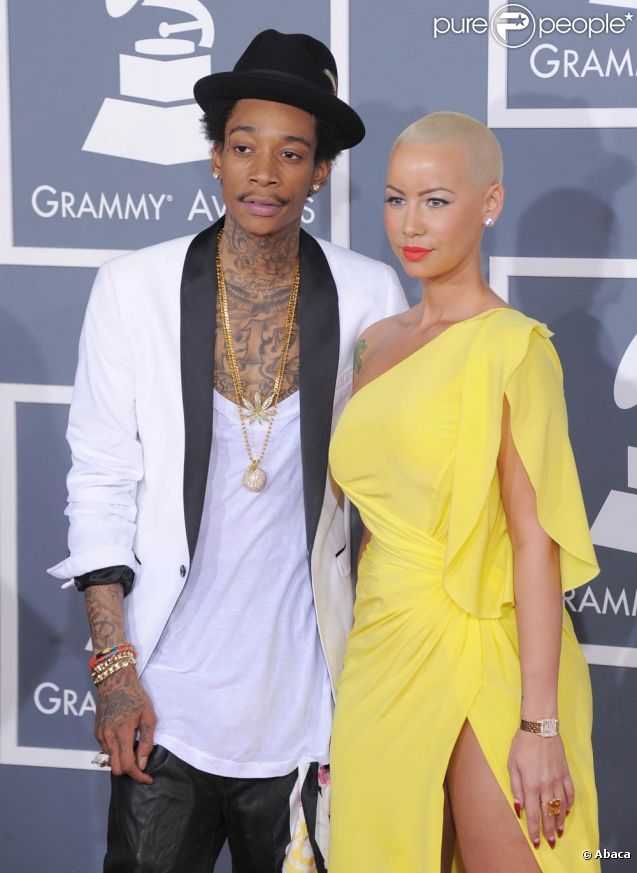 Amber Rose et Wiz Khalifa sur le tapis rouge de la cérémonie des 54e Grammy Awards au Staples Center de Los Angeles le 12 février 2012. Les stars étaient nombreuses à être venues accompagnées pour la grand-messe des récompenses musicales américaines.