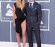 Adam Levine de Maroon 5 et Anna Vyalitsina sur le tapis rouge de la cérémonie des 54e Grammy Awards au Staples Center de Los Angeles le 12 février 2012. Les stars étaient nombreuses à être venues accompagnées pour la grand-messe des récompenses musicales américaines.