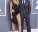 Adam Levine de Maroon 5 et Anna Vyalitsina sur le tapis rouge de la cérémonie des 54e Grammy Awards au Staples Center de Los Angeles le 12 février 2012. Les stars étaient nombreuses à être venues accompagnées pour la grand-messe des récompenses musicales américaines.
