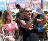 Christian Audigier et sa douce Nathalie Sorensen à Rio le 10 février 2012