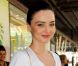 Miranda Kerr, toujours souriante et impeccable, quitte la boutique David Jones pour lequel elle a défilé. Sydney, le 15 février 2012.