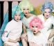 De gauche à droite : Hyoni Kang, Crystal Renn, Hanne Gaby Odiele et Maryna Linchuk (en perruque rose) en Une du magazine W Korea de mars 2012. 