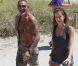 Christian Audigier et sa belle Nathalie Sorensen sortent de la plage à Miami le 24 mars 2012