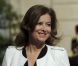 Valérie Trierweiler arrive souriante dans l'allée de l'Elysée lors de la passation de pouvoir entre Nicolas Sarkozy et François Hollande, le 15 mai 2012.