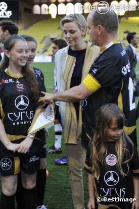 Albert de Monaco, la princesse Charlène et Michael Schumacher le 22 mai 2012 à Monaco pour un match de charité organisé au profit de l'association de la princesse Charlène