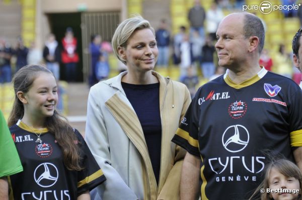 Albert de Monaco, la princesse Charlène et Michael Schumacher le 22 mai 2012 à Monaco pour un match de charité organisé au profit de l'association de la princesse Charlène