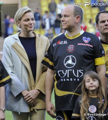 Albert de Monaco, la princesse Charlène et Michael Schumacher le 22 mai 2012 à Monaco pour un match de charité organisé au profit de l'association de la princesse Charlène