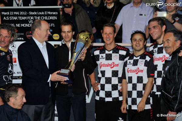Albert de Monaco et Michael Schumacher le 22 mai 2012 à Monaco pour un match de charité organisé au profit de l'association de la princesse Charlène