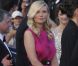 Kirsten Dunst en Christian Dior lors de la montée des marches de Sur la route, au Festival de Cannes le 23 mai 2012.