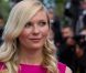 Kirsten Dunst en Christian Dior lors de la montée des marches de  Sur la route , au Festival de Cannes le 23 mai 2012.