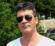 Simon Cowell, membre du jury de X Factor, arrive sur les auditions de X Factor, au Texas, le jeudi 24 mai 2012.