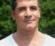Simon Cowell, membre du jury de X Factor, arrive sur les auditions de X Factor, au Texas, le jeudi 24 mai 2012.