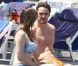 Kelly Brook et son compagnon Thom Evans profitent des joies de la mer et du soleil sur l'île d'Ischia, en Italie, le 9 juillet 2012