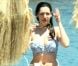 Kelly Brook et son compagnon Thom Evans profitent des joies de la mer et du soleil sur l'île d'Ischia, en Italie, le 9 juillet 2012