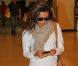 Eva Longoria arrive à l'aéroport de Miami le 3 août 2012 après avoir assisté à l'enterrement de son amie Lupe Ontiveros