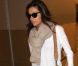 Eva Longoria arrive à l'aéroport de Miami le 3 août 2012 après avoir assisté à l'enterrement de son amie Lupe Ontiveros