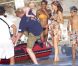  Boris Becker porte son petit Amadeus pour l'installer sur le bateau aux côtés de sa femme Lilly Kerssenberg en vacances en famille à Formentera le 13 août 2012 