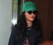 Rihanna, habillée d'un minishort et de bottines Chloë Sevigny pour Opening Ceremony et d'un pull Kenzo, une casquette de la même marque sur la tête, sort de son hôtel londonien. Le 28 août 2012.