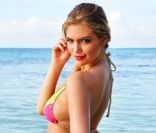 Kate Upton, plantureuse en bikini Lady Lace pour Beach Bunny.