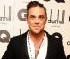 Robbie Williams, habillé en Farrell, recevait le trophée d'Icône de l'Année lors des GQ Men Of The Year Awards 2012 à la Royal Opera House. Londres, le 4 septembre 2012.