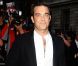 Robbie Williams à son arrivée à la Royal Opera House pour les GQ Men of the Year Awards. Londres, le 4 septembre 2012.